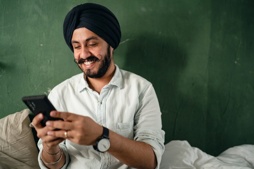 indian-man-browsing-smartphone