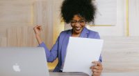 women-reading-documents-happy -face